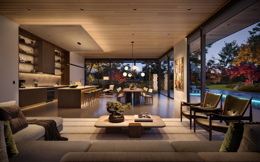 A home with an open floor plan and floor-to-ceiling windows softly illuminated by overhead fixtures.